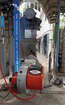 tgboiler vertical 2000kg multi-fuel steam boiler is working in uzbekistan factory